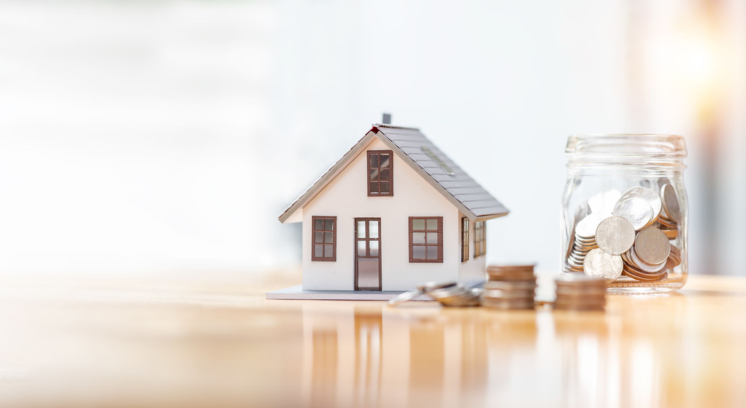 House with jar of money