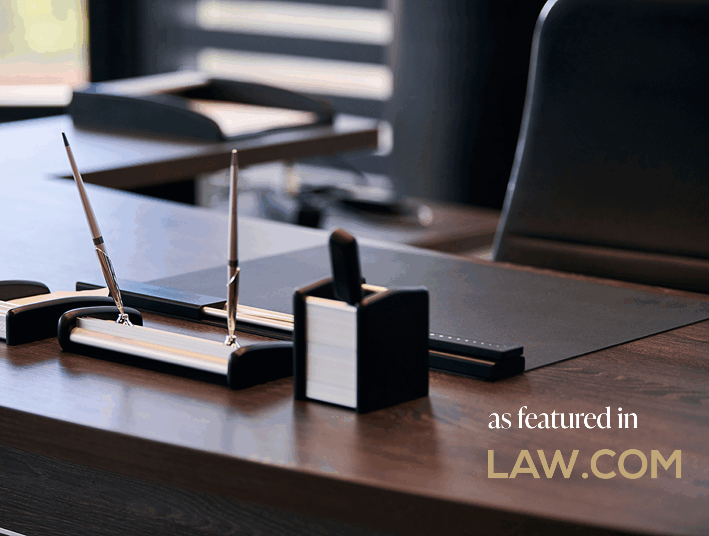 Desk that has wording overlayed that says as featured in law.com