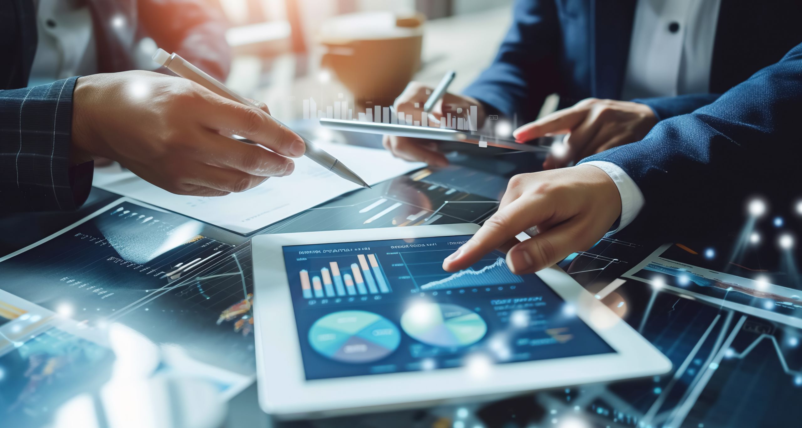 Professionals explore complex data analytics displayed on a digital tablet, highlighting modern business strategy and decision-making.