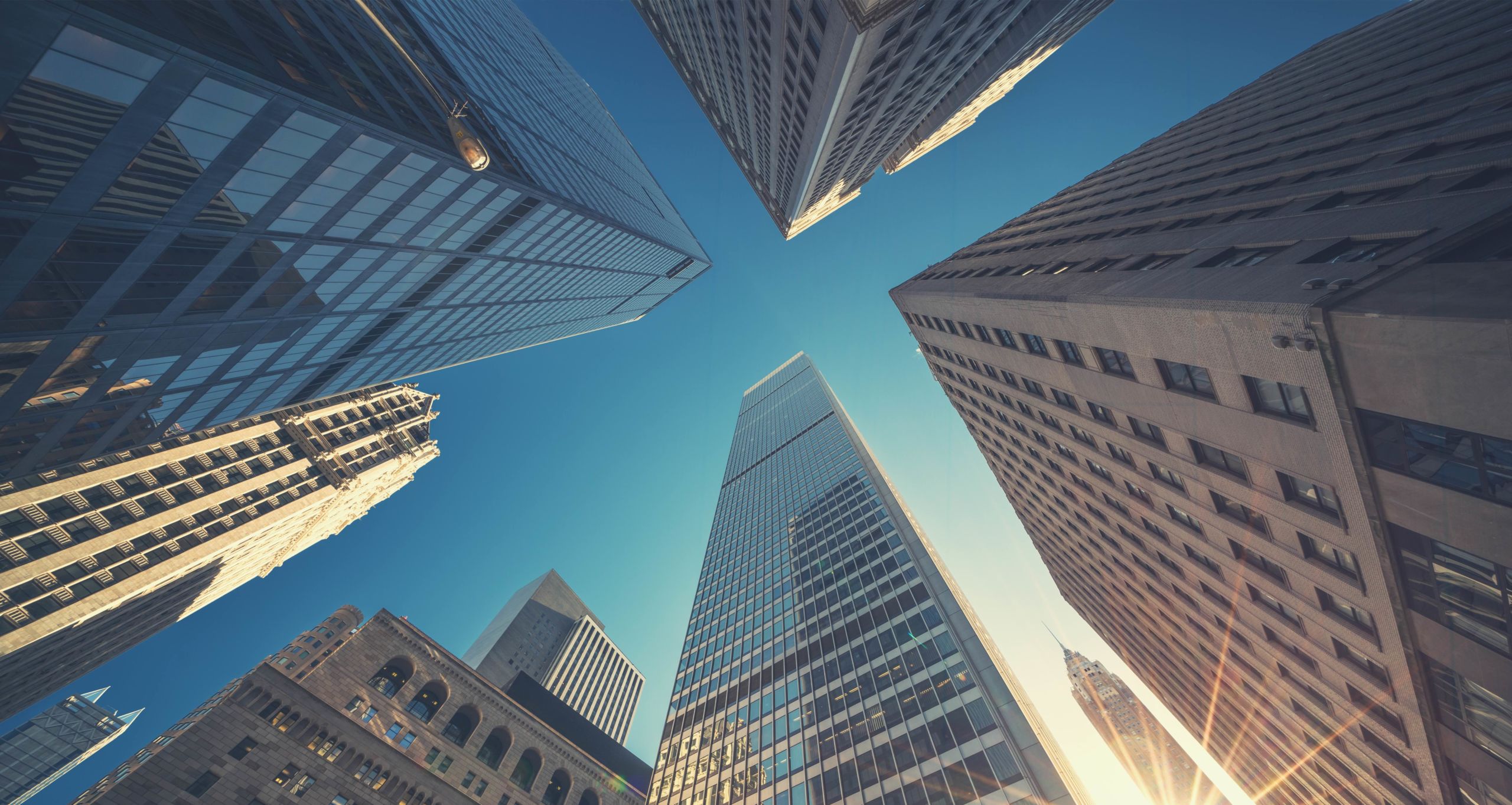 Office building top view background in retro style colors. Manhattan buildings of New York City center - Wall street